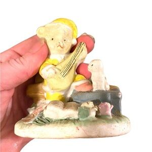 Teddy bear playing music